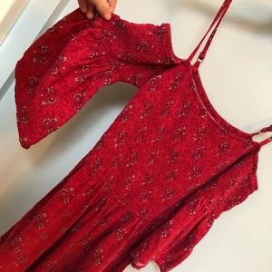 Red ruched off the shoulder flowy romper